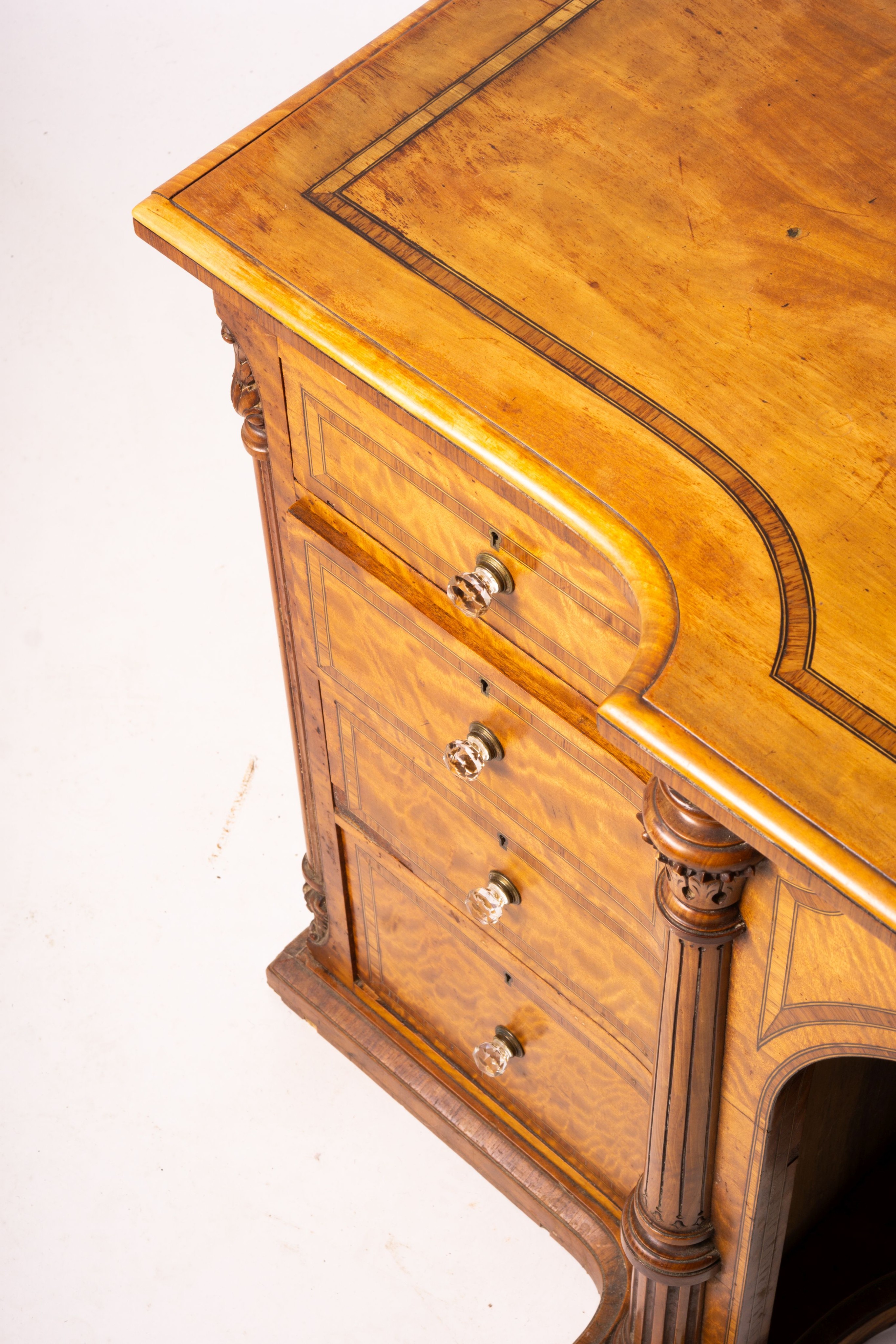 A late Victorian banded satinwood kneehole desk, width 138cm, depth 67cm, height 71cm